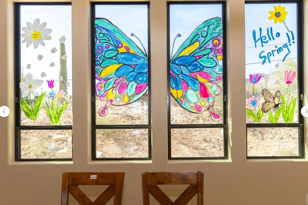 House One butterfly window artwork