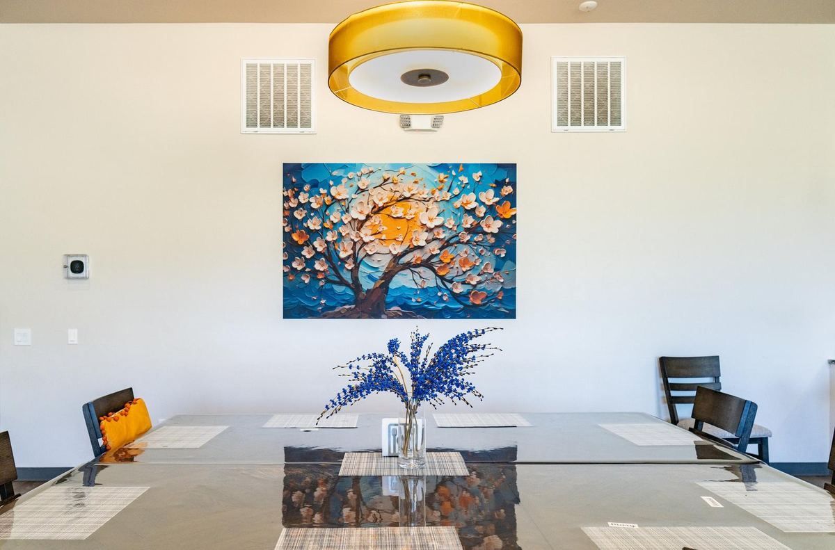 House Three dining table and artwork